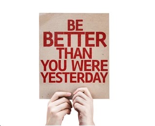 Motivational quote: "Be better than you were yesterday" displayed artistically on a serene nature backdrop.