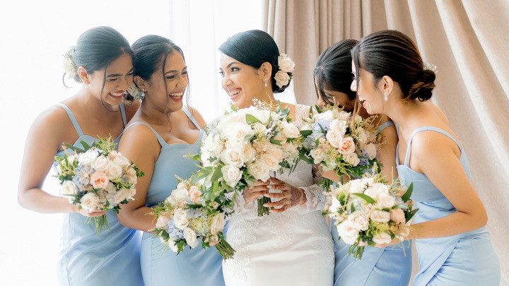 Bride and joyful bridesmaids sharing laughter on the wedding day, capturing happy moments in Sri Lanka matrimony, Mangala Yojana, Poruwa.lk | ශ්‍රී ලාංකීය මංගල යෝජනා, and top marriage proposals in Sri Lanka.