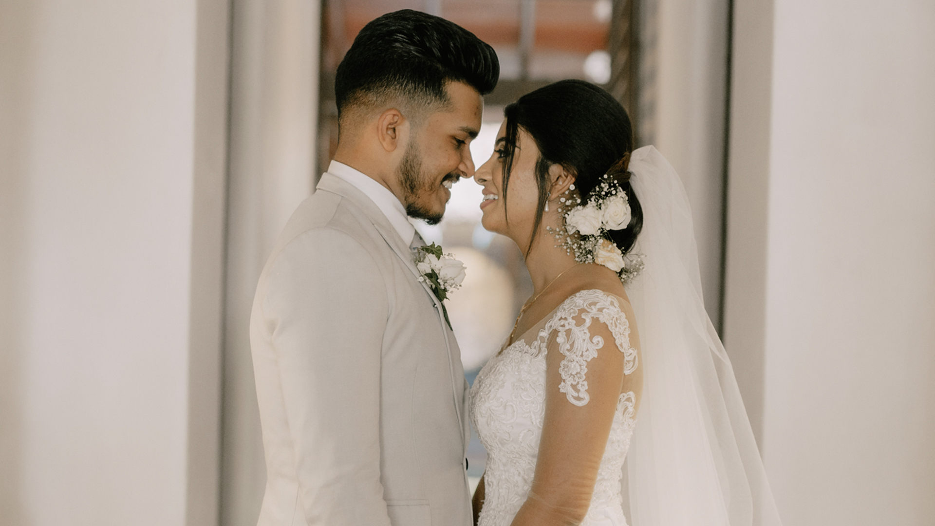 Bride and groom in elegant wedding attire sharing smiles, trust, and love during a Poruwa ceremony, representing Poruwa.lk | ශ්‍රී ලාංකීය මංගල යෝජනා, Mangala Yojana, wedding proposal website, Matrimony Sri Lanka, Sri Lanka matrimony, Lankan brides and grooms, Buddhist matrimony, Catholic marriage proposals, LankaMatrimony, and trusted marriage proposals in Sri Lanka.
