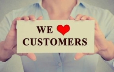 A cheerful design displaying "We Love Customers," highlighting the importance of customer relationships in business.