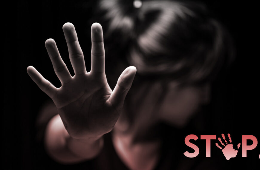 A woman raises her hand with "stop" written on her palm, symbolizing resistance and awareness in preventing violence against women, highlighting safety in Sri Lankan matrimony, Mangala Yojana, and marriage proposals in Sri Lanka through trusted wedding proposal websites like Poruwa.lk | ශ්‍රී ලාංකීය මංගල යෝජනා.