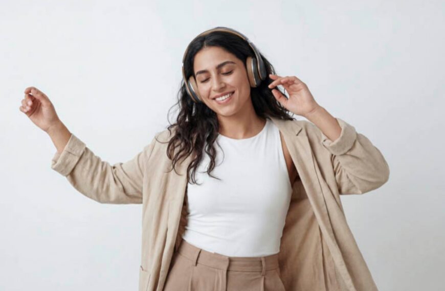 A joyful woman with long dark hair wearing headphones and dancing peacefully, representing modern marriage proposals in Sri Lanka, matrimony Sri Lanka, Lanka brides and grooms, wedding proposal website Mangala Yojana, Poruwa.lk | ශ්‍රී ලාංකීය මංගල යෝජනා, Buddhist matrimony, Catholic marriage proposals, Liyathabara marriage proposals in Sri Lanka, and traditional Poruwa ceremony.