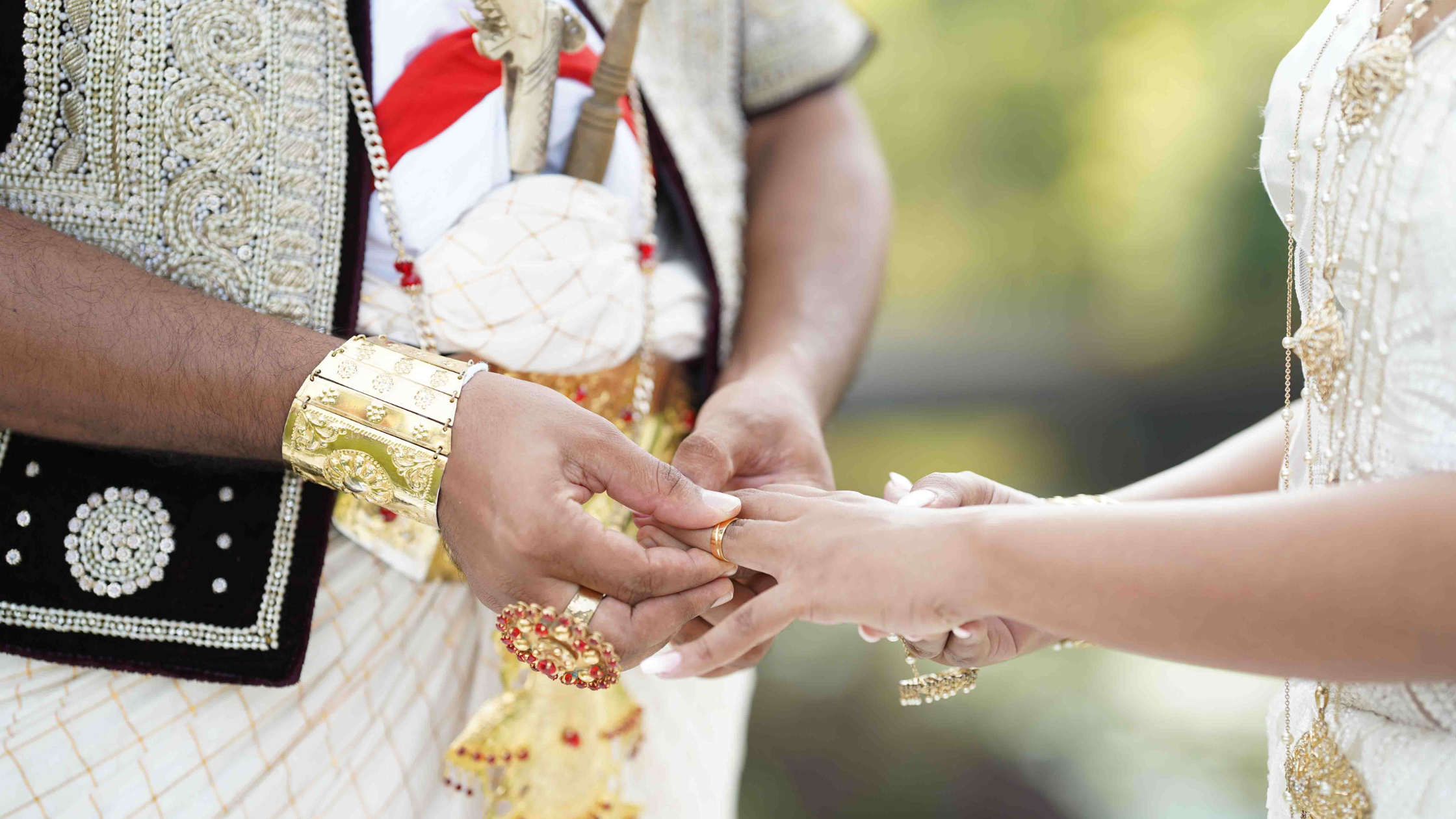 A man and woman in traditional attire hold hands, symbolizing unity and cultural heritage. (mangala yojana, wedding proposal website, marriage proposal sri lanka, marriage proposals in sri lanka, marriage proposals sri lanka, marriage proposals, matrimony sri lanka, srilanka matrimony, poruwa.lk | ශ්‍රී ලාංකීය මංගල යෝජනා, poruwa ceremony, lankamatrimony, liyathabara marriage proposal, catholic marriage proposals, hitad marriage proposals, lanka brides and grooms, purahanda lk, buddhist matrimony, liyathabara marriage proposals in sri lanka)