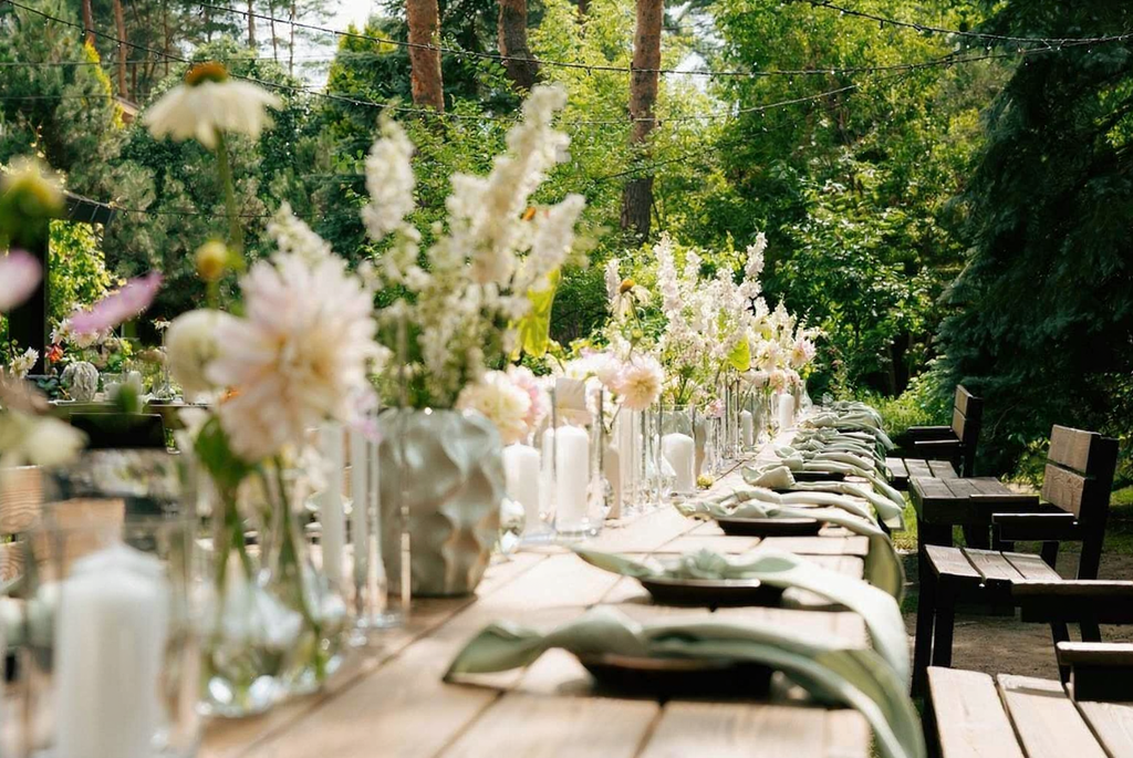 A long wedding table adorned with colorful flowers and elegant vases, creating a vibrant setting for a Poruwa ceremony and Sri Lankan wedding celebrations. The décor reflects traditional mangala yojana themes and is ideal for marriage proposals in Sri Lanka, wedding proposal website inspiration, matrimony Sri Lanka, srilanka matrimony, lankamatrimony, lanka brides and grooms, Buddhist matrimony, Catholic marriage proposals, liyathabara marriage proposals in Sri Lanka, hitad marriage proposals, purahanda lk, and Poruwa.lk | ශ්රී ලාංකීය මංගල යෝජනා.