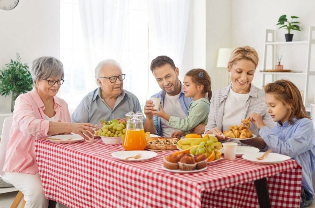 A happy family gathered around a dining table filled with a variety of delicious dishes, sharing a meal and enjoying quality time together, symbolizing love, togetherness, family bonding, and strong relationships. The image reflects the importance of family values in marriage and meaningful connections through a trusted wedding proposal website, mangala yojana, marriage proposal Sri Lanka, marriage proposals in Sri Lanka, marriage proposals Sri Lanka, marriage proposals, matrimony Sri Lanka, and srilanka matrimony. It also highlights Poruwa.lk | ශ්‍රී ලාංකීය මංගල යෝජනා, the traditions of the poruwa ceremony, and matchmaking platforms including lankamatrimony, liyathabara marriage proposal, liyathabara marriage proposals in Sri Lanka, catholic marriage proposals, buddhist matrimony, hitad marriage proposals, purahanda lk, and lanka brides and grooms seeking genuine, compatible, and lifelong partners.