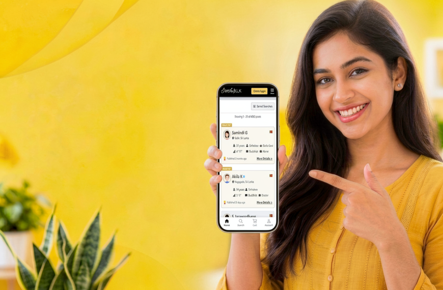 A smiling woman in a yellow top holds a smartphone displaying a matrimonial profile interface, symbolizing the ease of finding a compatible life partner through a trusted wedding proposal website. The image represents modern mangala yojana services, marriage proposal sri lanka, marriage proposals in sri lanka, marriage proposals sri lanka, marriage proposals, matrimony sri lanka, and srilanka matrimony. It also highlights poruwa.lk | ශ්රී ලාංකීය මංගල යෝජනා, where lanka brides and grooms can safely connect for genuine relationships while respecting traditional values such as the poruwa ceremony. The concept includes lankamatrimony, liyathabara marriage proposal, liyathabara marriage proposals in sri lanka, catholic marriage proposals, buddhist matrimony, hitad marriage proposals, and purahanda lk for those seeking lifelong, compatible partners.